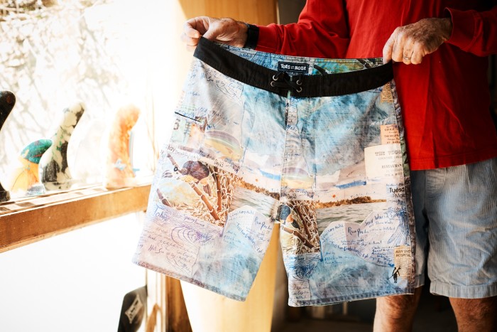 Toes on the Nose board shorts featuring Caramanico’s voodoo lounge artwork