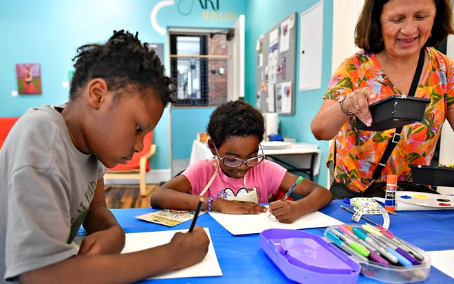 From left, Stephen Zitrick, 10, and Irisa Zitrick, 7, both of Mount Wolf, participate in local artist and art therapist Rosa Luz Catterall’s monthly art wellness activity for the first time, at Marketview Arts in York City, Saturday, July 6, 2024. (Dawn J. Sagert/The York Dispatch)