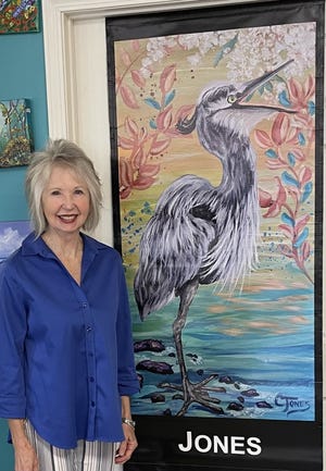 Cheryl Jones and her heron banner.