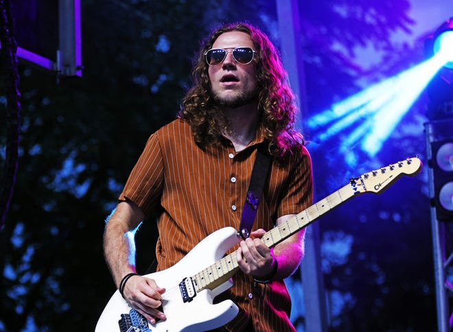 The Not Quite Brothers band performs classic rock at the Waukee Arts Festival on Friday, July 19. The two-day festival at Centennial Park featured local artists and live music.