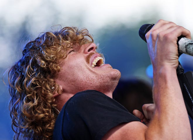 The Not Quite Brothers band performs classic rock at the Waukee Arts Festival on Friday, July 19. The two-day festival at Centennial Park featured local artists and live music.