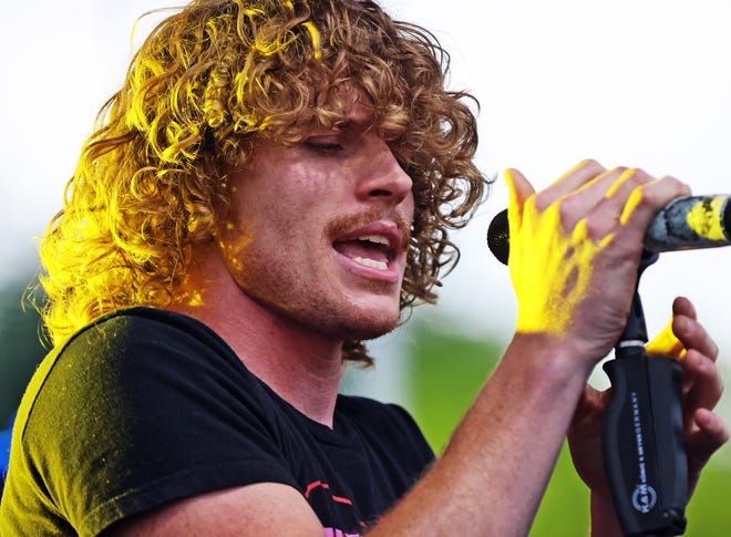 The Not Quite Brothers band performs at the Waukee Arts Festival on Friday, July 19. The two-day festival at Centennial Park featured local artists and live music.