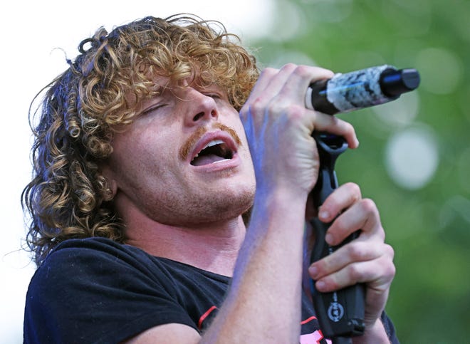 The Not Quite Brothers band performs classic rock at the Waukee Arts Festival on Friday, July 19. The two-day festival at Centennial Park featured local artists and live music.