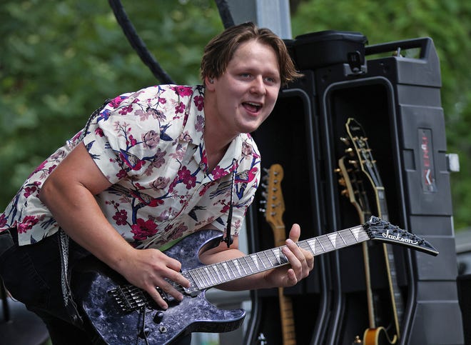 The Not Quite Brothers band performs classic rock at the Waukee Arts Festival on Friday, July 19. The two-day festival at Centennial Park featured local artists and live music.