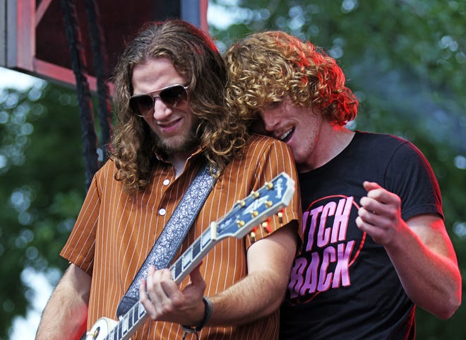 The Not Quite Brothers band performs classic rock at the Waukee Arts Festival on Friday, July 19. The two-day festival at Centennial Park featured local artists and live music.