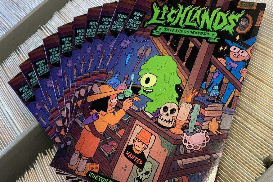 Copies of LICHLAND: Into the Undervoid is shown displayed on a stack of comics in this undated photo. 