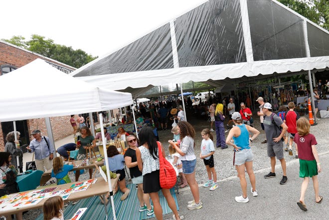 The crowd at FoxSaid Festival at the Cotton Press in Athens, Ga., on Saturday, July 27, 2024. The art and music festival featured interactive art with a number of local artists and raised money for art education in local schools.