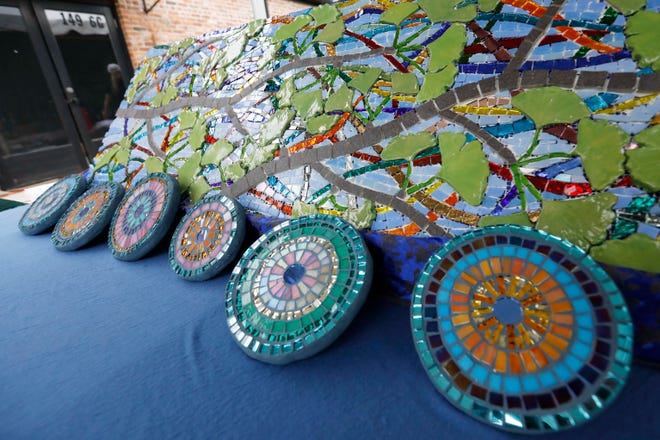 Mosaics from local artist Krysia Ara at FoxSaid Festival at the Cotton Press in Athens, Ga., on Saturday, July 27, 2024. The art and music festival featured interactive art with a number of local artists and raised money for art education in local schools.