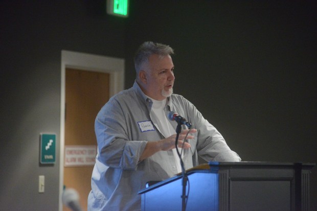 Ronnie Williford speaks about his brother Hollis, a famous Loveland artist who passed away in 2007, at an event remembering his life and work Friday (Will Costello / Loveland Reporter Herald).