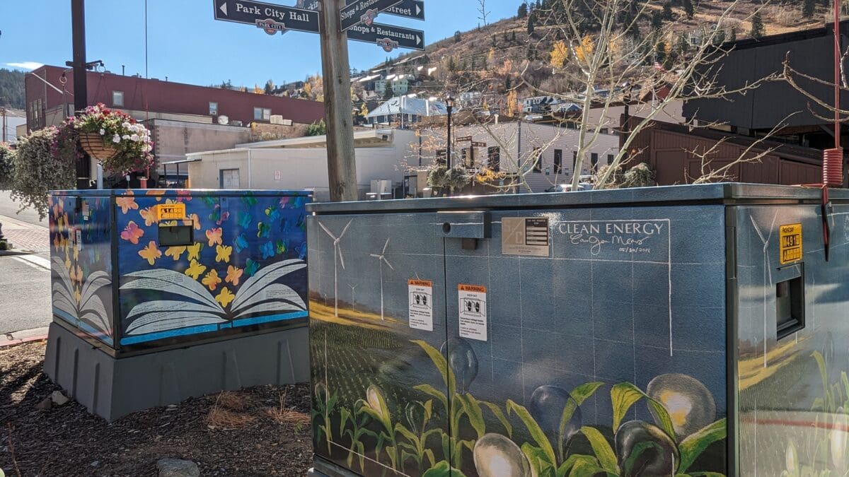 Two of the utility boxes beautified during the 2018 emPOWERment project as seen in October 2023.