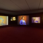 A multiscreen video installation showing a Black man in a blue jacket. Beside him, on other screens, there are photographs of another, similar-looking Black man.