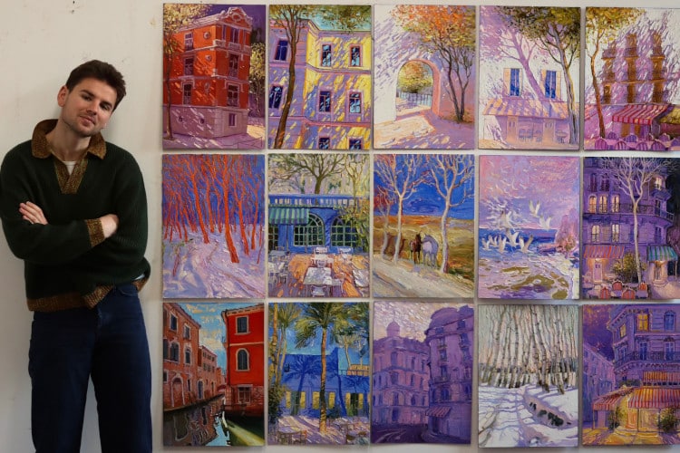 Artist Sergiu Ciochina poses with his paintings