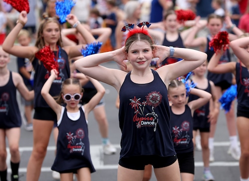 Hundreds of people young and old cheer at Manlius Fourth of July Parade