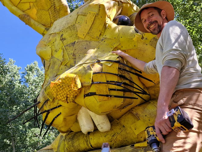 An undated photo of self-described trash artist Thomas Dambo working on a sculpture of a giant rabbit made from recycled materials in Detroit Lakes, Minnesota.