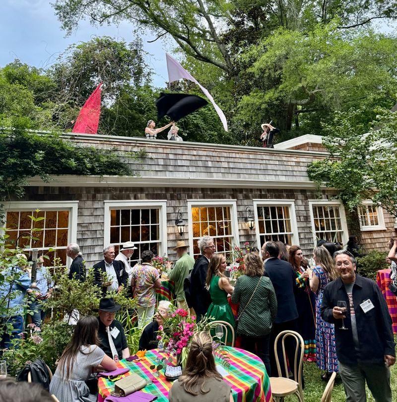 Beacon Dance performers took to the rooftop with flags and music while performing at Paradise Garden's Atlanta Patron Party in June.