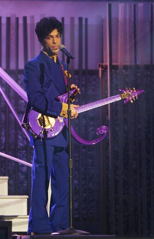 Grammy and Oscar-winning recording artist Prince performs the song "Purple Rain" at the 46th Annual Grammy Awards held at the Staples Center on February 8, 2004 in Los Angeles, California.