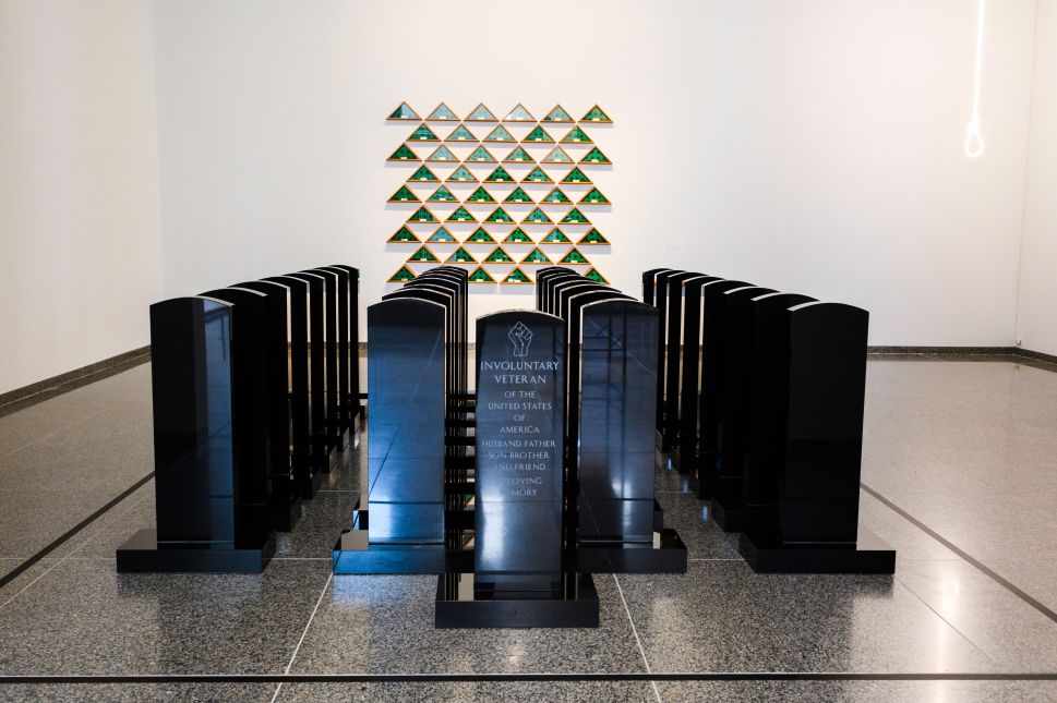 Rows of headstones in a gallery show