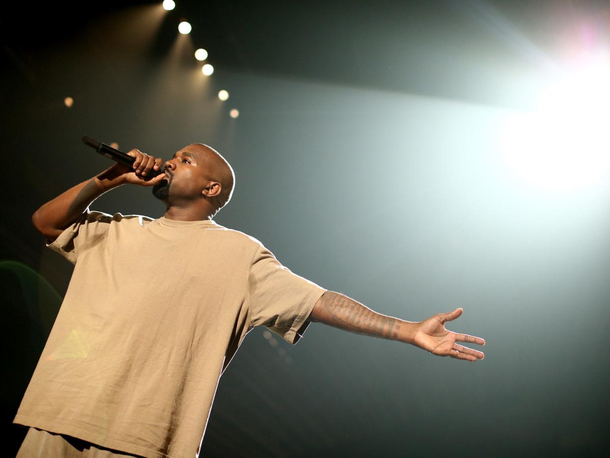 Kanye West onstage at the 2015 VMAs.