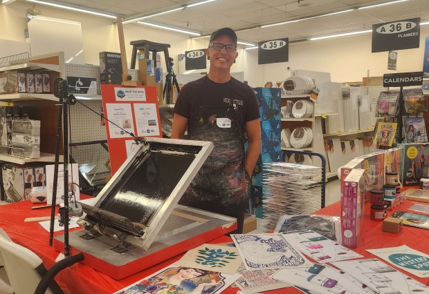 Pro screen printer Alden Knight was showing patrons at Palace...