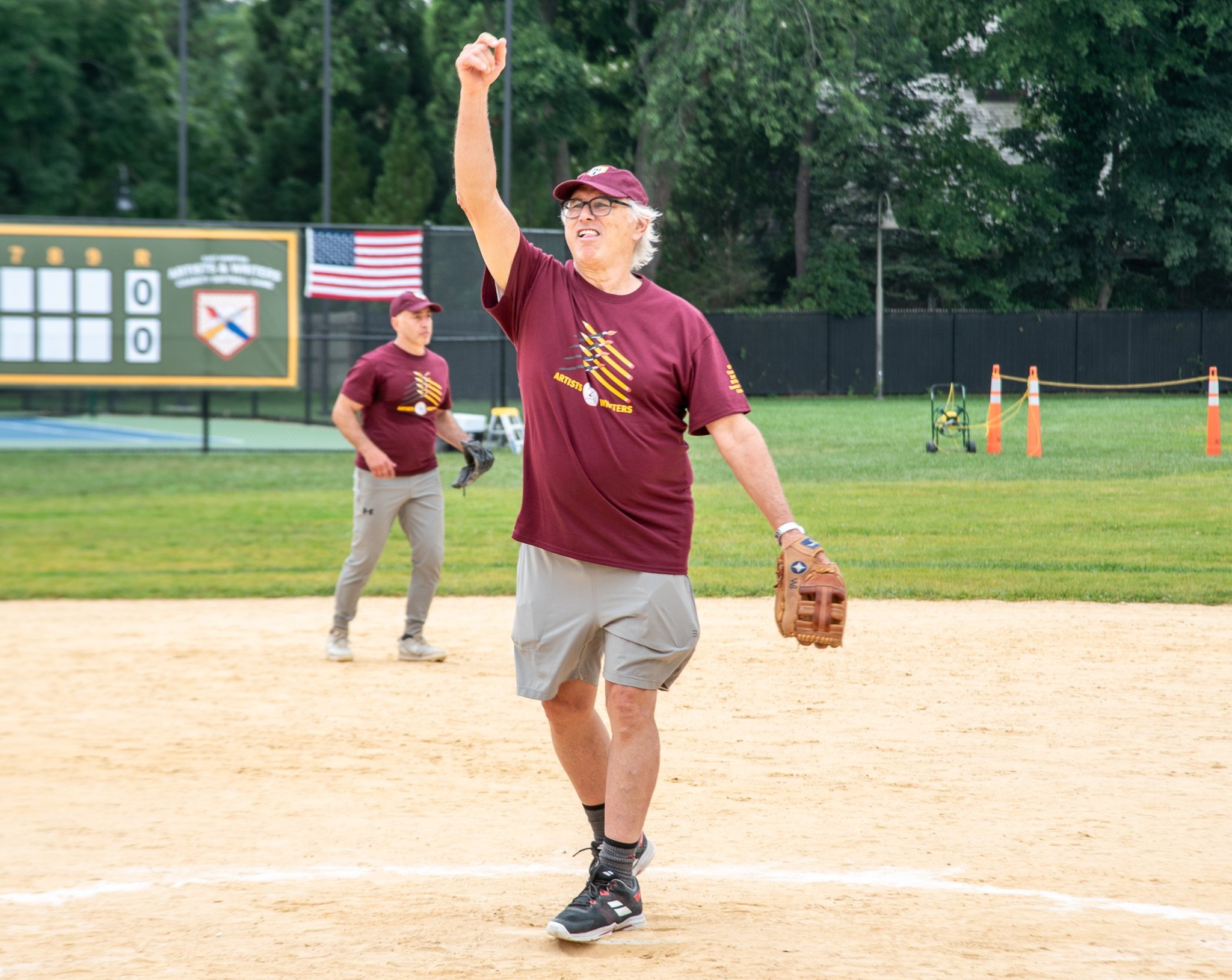 Eric Fischl pitching for the Artists team at the 2024 Artists & Writers Charity Softball Game