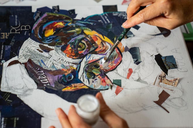 Artist Mary Mindiola works on a new piece of artwork Friday, July 5, 2024, at her studio in Indianapolis. Mindiola creates detailed work made from cut magazine paper after a trip to the Cayman Islands, where she found a large amount of single-use plastic along the beach shoreline.