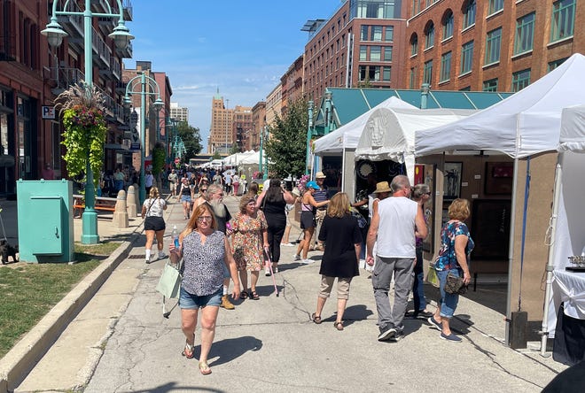 People attend the Third Ward Art Festival on Broadway in The Historic Third Ward on Saturday, Sept. 2, 2023. The annual show ran Saturday and Sunday and featured the work of more than 150 juried artists from around the country.