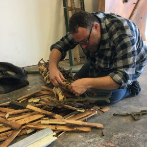 Wilson Artist Jeff Bell dismantling a piano